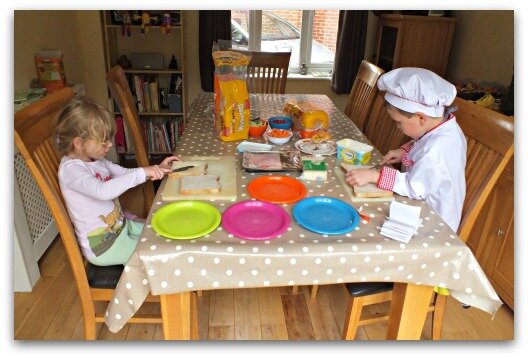 Making sandwiches for a pretend cafe
